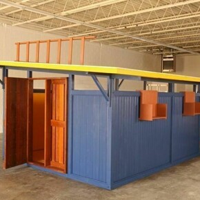 Siah Armajani: Alfred Whitehead Reading Room, 2013. Wood, plexiglass, brass, glass, 244 x 366 x 488 cm. Commissioned by Parasol unit foundation for contemporary art on the occasion of the exhibition Siah Armajani. Photograph: Larry Marcus