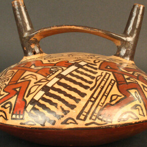 Botella asa puente: ronda de decapitados

Materiales: Cerámica

100 - 700 d.C.

Medidas: 147 mm de alto