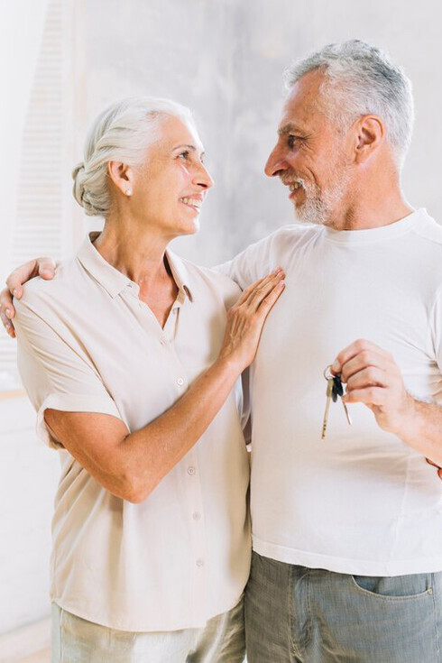 A senior couple sharing intimate moments of love, showcasing the beauty of aging together