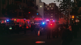 Unfolding emergency scene along the bustling thoroughfare of Kent Avenue, in New York City, United States