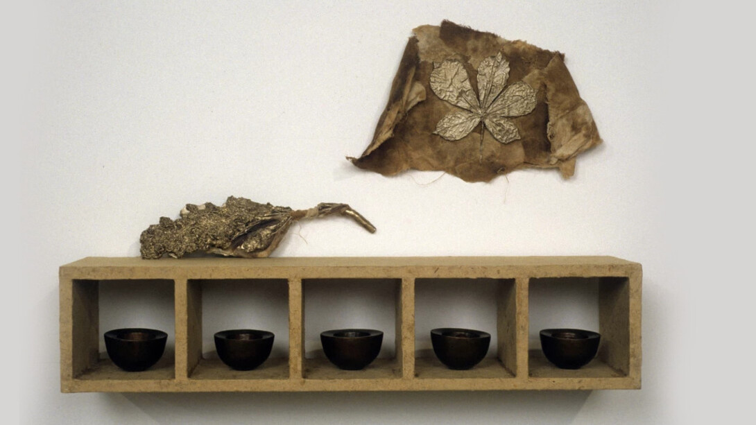 Esca, 1997, polished patinated bronze, horse-chestnut seeds, bali-paper, cloth, wood, 33 x 61.6 x 13.7 cm, 13 x 24 1/4 x 5 3/8 ins © Michelle Stuart