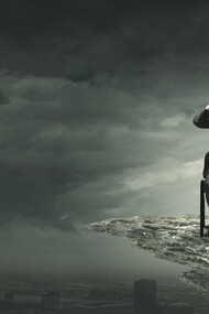A man stuck in his suffering, sitting on a cliff...