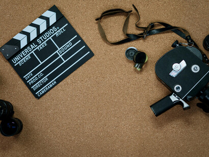 Vintage filming equipment placed on a table