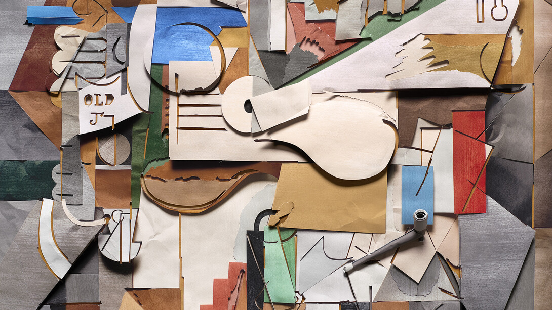 Vik Muniz, Surfaces: Bottle, Guitar and Pipe, after Pablo Picasso, 2023, mixed media, one of a kind, 44x53x2 1/4 inches. Courtesy of the artist and Rena Bransten Gallery, San Francisco