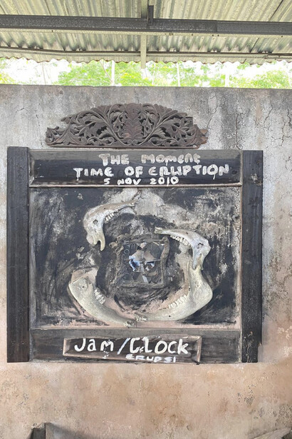 The remnants of a wall clock that was struck by the lava during the 2010 Mount Merapi volcano eruption in Indonesia, showcasing the sheer power of nature and her forces