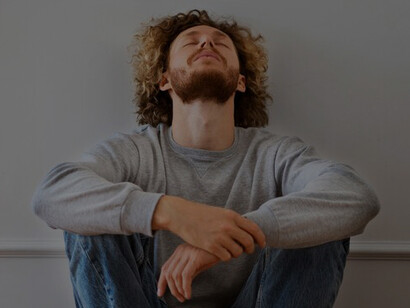 An anxious, stressed, and depressed man, highlighting the importance of understanding and addressing these emotions for holistic well-being