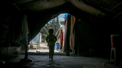 Child in a temporary shelter