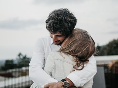 Couple hugging and loving each other, having a partner can support you in achieving goals and happiness in life