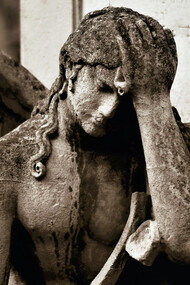 Statue of an angel, full of sadness