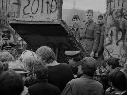 Captured during the momentous fall of the Berlin Wall, a nation on the brink of transformation, as people of all backgrounds celebrated the destruction of the physical and ideological divide that had shaped Germany for nearly 30 years