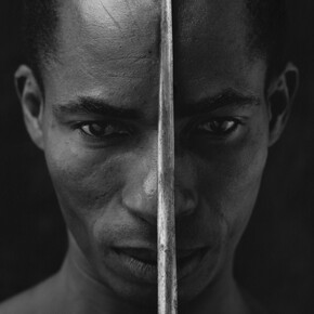 Eduardo with dagger, 1990, silver print, cm 100x100 