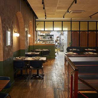 Honey & Smoke Grill House, ground floor interior, 2023. Photo © Patricia Niven