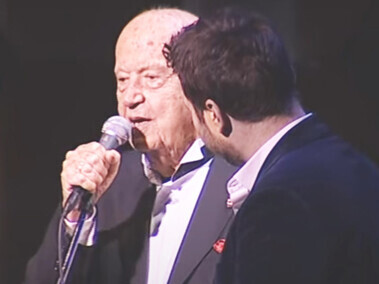 Mimis Plessas also contributed to education and media as a professor and radio producer