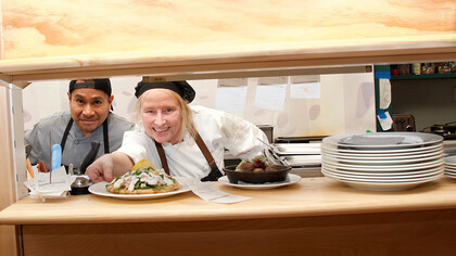 Chef Bengstsson presenting her dishes with a smile