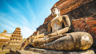 A statue of Buddha, in Wat Mahathat, Thailand