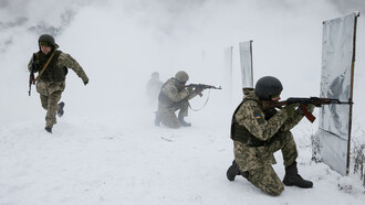 Ukrainian troops assemble on the border
