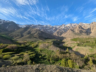 The Atlas Mountains beneath open skies, reflecting Morocco's connection between history, land, and identity