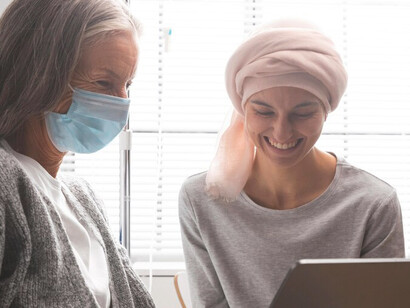 Female cancer patients sharing a conversation in the hospital