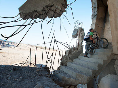 War-torn Gaza: a collapsed building after Israeli airstrikes