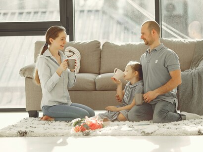 Happy family having fun together in the living room at home