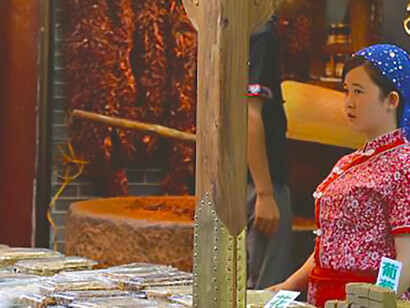 Discover vibrant spice stalls in the enchanting Muslim Quarter of Xi'an, Shaanxi, China, offering a sensory journey through exotic flavors and aromas