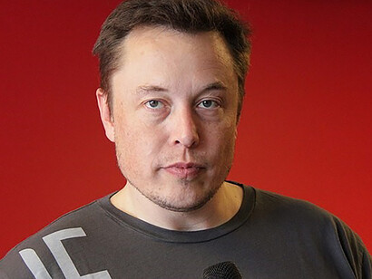 On January 31, 2014, at the Tesla Amsterdam service center, the brilliant Elon Musk addressed the audience through a microphone photo by Maarten Van Aerde