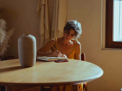 A woman writes about the things she dreams of doing but probably won't, in her journal