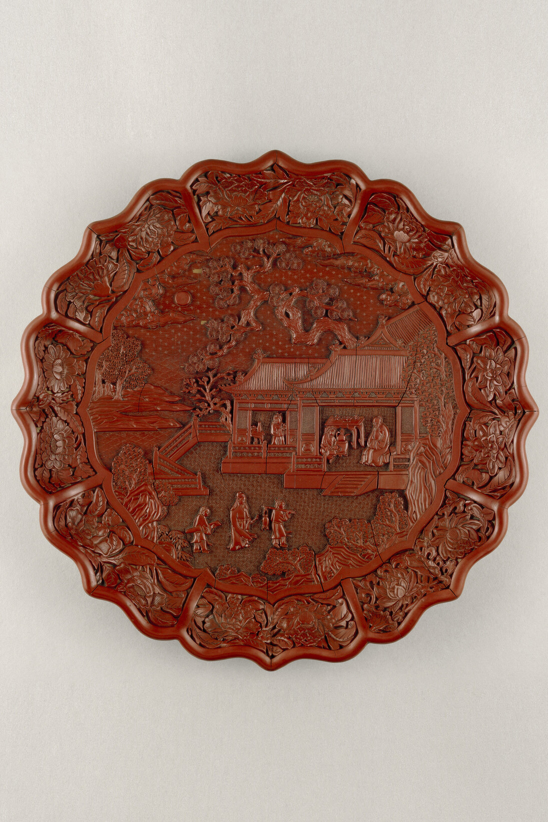 Carved red lacquer on wood core, Yongle mark and period 1403-24, South China, diameter 34.8 cm © The Trustees of the British Museum