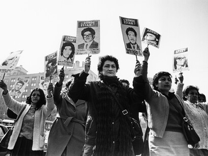 Women of the Association of Families of the Detained-Disappeared demonstrate in front of La Moneda Palace during the Pinochet military regime
