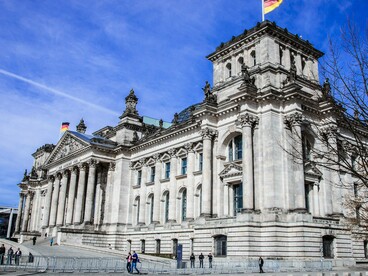 The grand entrance of the Reichstag Building in Berlin, Germany, representing how clear architectural organization fosters confident wayfinding