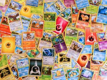 A spread of Pokémon cards featuring classic and modern designs, symbolising the longevity of the trading card market