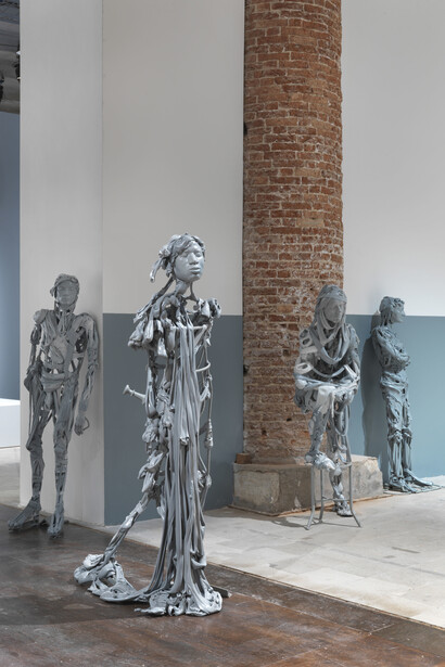 Paweł Althamer, Venetians, 2013, plastic and plaster on metal construction, installation of 90 parts, dimensions variable. Installation view: “The Encyclopedic Palace,” 55th International Art Exhibition, Venice Biennale, 2013. Photo by Jens Ziehe, courtesy neugerriemschneider, Berlin, and Foksal Gallery Foundation, Warsaw