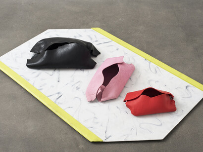 Hannah Wilke, Three Sisters, 1980-84, 3 painted ceramics on painted board, Red: 55.9 x 30.5 x 26.7 cm / 22 x 12 x 10 1/2 ins, Pink: 72.4 x 36.8 x 27.9 cm / 28 1/2 x 14 1/2 x 11 ins, Black: 86.4 x 47.6 x 27.9 cm / 34 x 18 3/4 x 11 ins, Board: 5.1 x 208.3 x 134.6 cm / 2 x 82 x 53 ins, © Marsie, Emanuelle, Damon, and Andrew Scharlatt, Hannah Wilke Collection & Archive, Los Angeles; Courtesy Alison Jacques Gallery, London; Photography Michael Brzezinski
