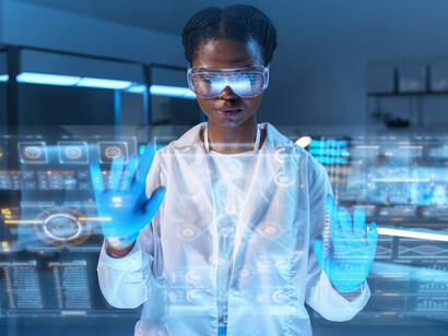 A medical researcher works with a holographic brain display and advanced AI technology in a futuristic laboratory