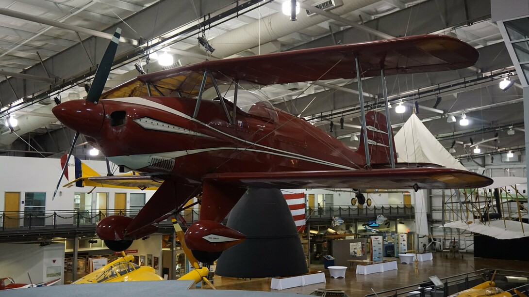 A Bücker Bü 133 Jungmeister replica with a Lycoming IO-540 engine on display at the Frontiers of Flight Museum at Dallas Love Field in Dallas, Texas, United States