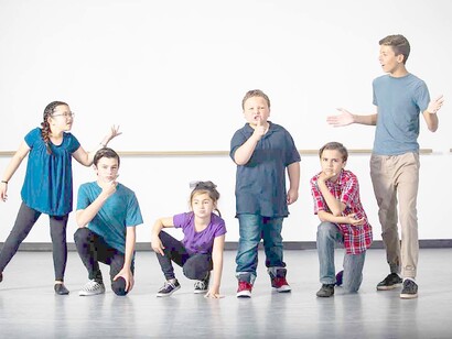 Students acting in a play role, to learn languages, in new modern ways