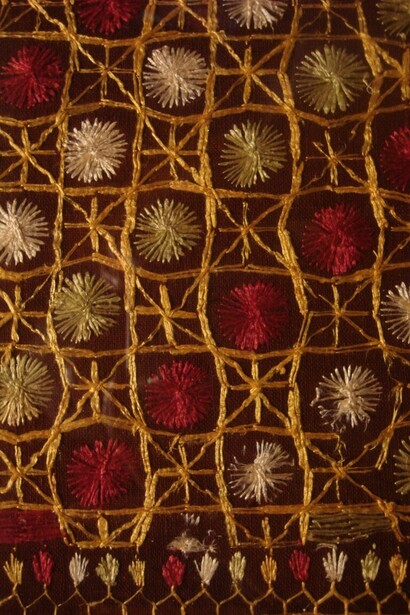 Phulkari embroidery features intricate and vibrant designs