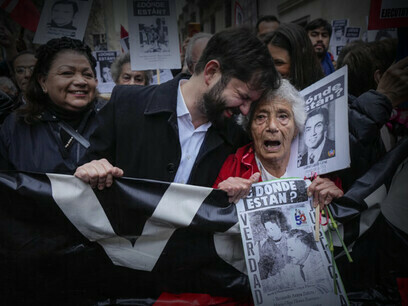 Gabriel Boric in a demonstration commemorating the 50th anniversary of the Coup d'état in Santiago, Chile