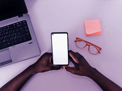 A blank screen holds endless possibilities, symbolizing Nigeria's journey with mobile phones, a catalyst for communication, innovation, and progress
