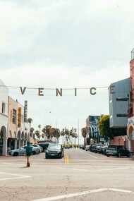 Pacific Avenue under the iconic Venice beach sign in Los Angeles, California, USA 