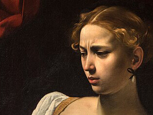 Giuditta e Oloferne, Caravaggio, (1598–1599), particolare. Caravaggio, con il suo rapporto unico con l'oscurità, il sangue e la morte, riesce a rappresentare in modo drammatico gli eventi attraverso la sua arte