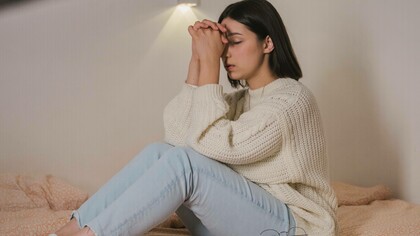 Woman asking the universe for help