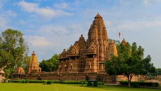 Kandariya Mahadeva Temple, Khajuraho, Madhya Pradesh, India, adorned with intricate stone carvings, symbolising the harmony between nature, spirituality, and human craftsmanship