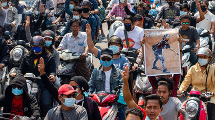 Thousands turned out for the funeral of 19-year-old Ma Kyal Sin, who was gunned down at a protest on the streets of Mandalay 