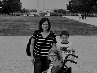 Author Amy Daniels, with her son and daughter at the Washington Monument in Washington, DC, USA