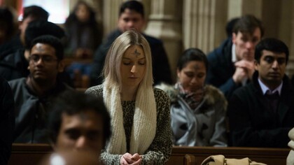 Catholics in a church in England praying for peace in Ukraine