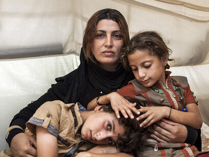 Amira and her Children by Ivor Prickett © Ivor Prickett/UNHCR/Panos Pictures