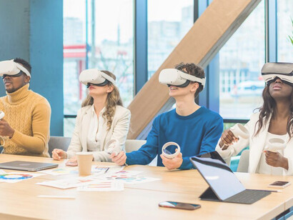 Architects wearing VR goggles during a business conference in a sleek, modern office