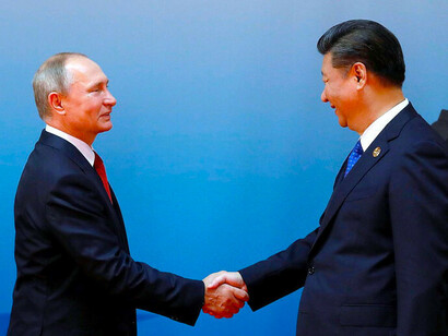 Vladimir Putin and Xi Jiping