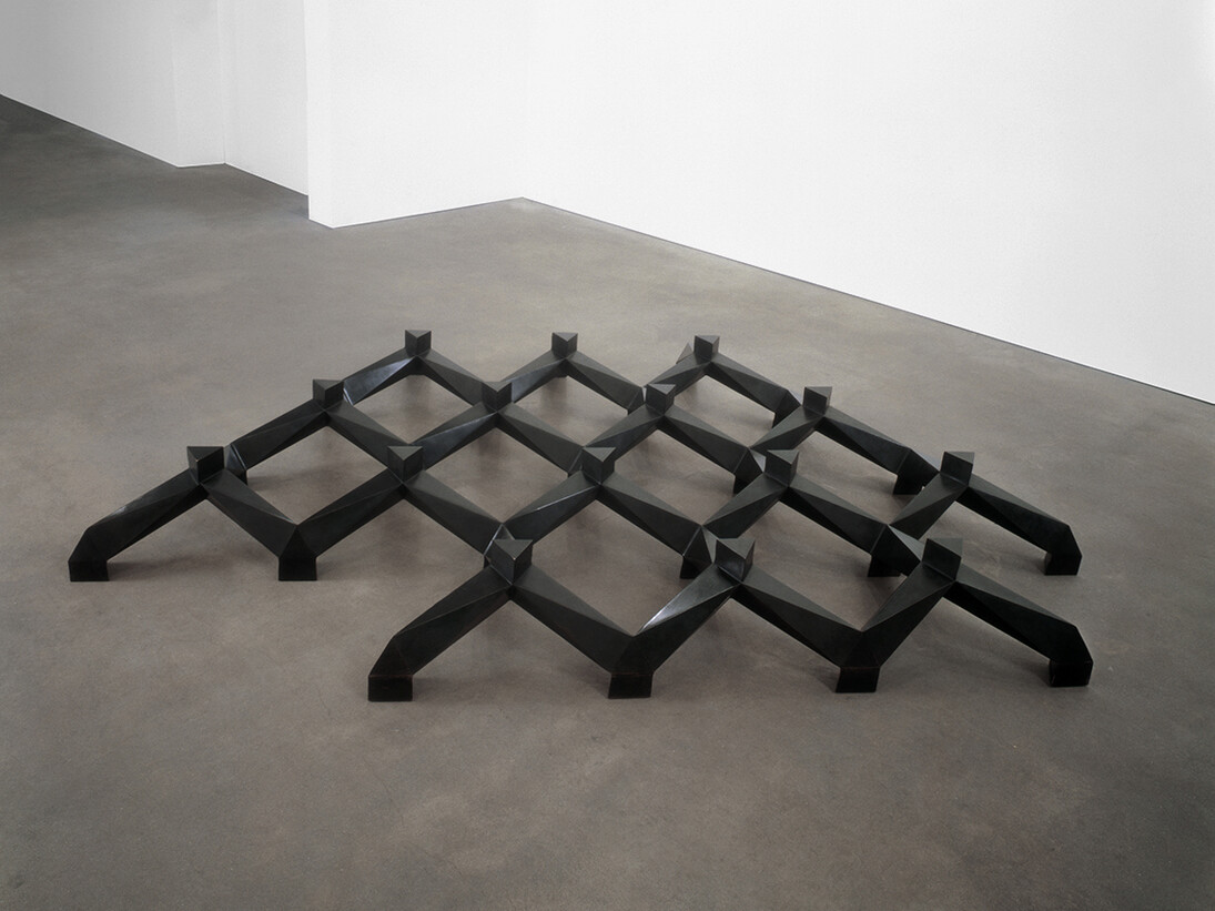 Tony Smith, Smog, 1969-70, Cast bronze, black patina, 12 x 113 x 79 in. / 31 x 287 x 201 cm, © Tony Smith, Courtesy Timothy Taylor Gallery, London and Matthew Marks Gallery, New York